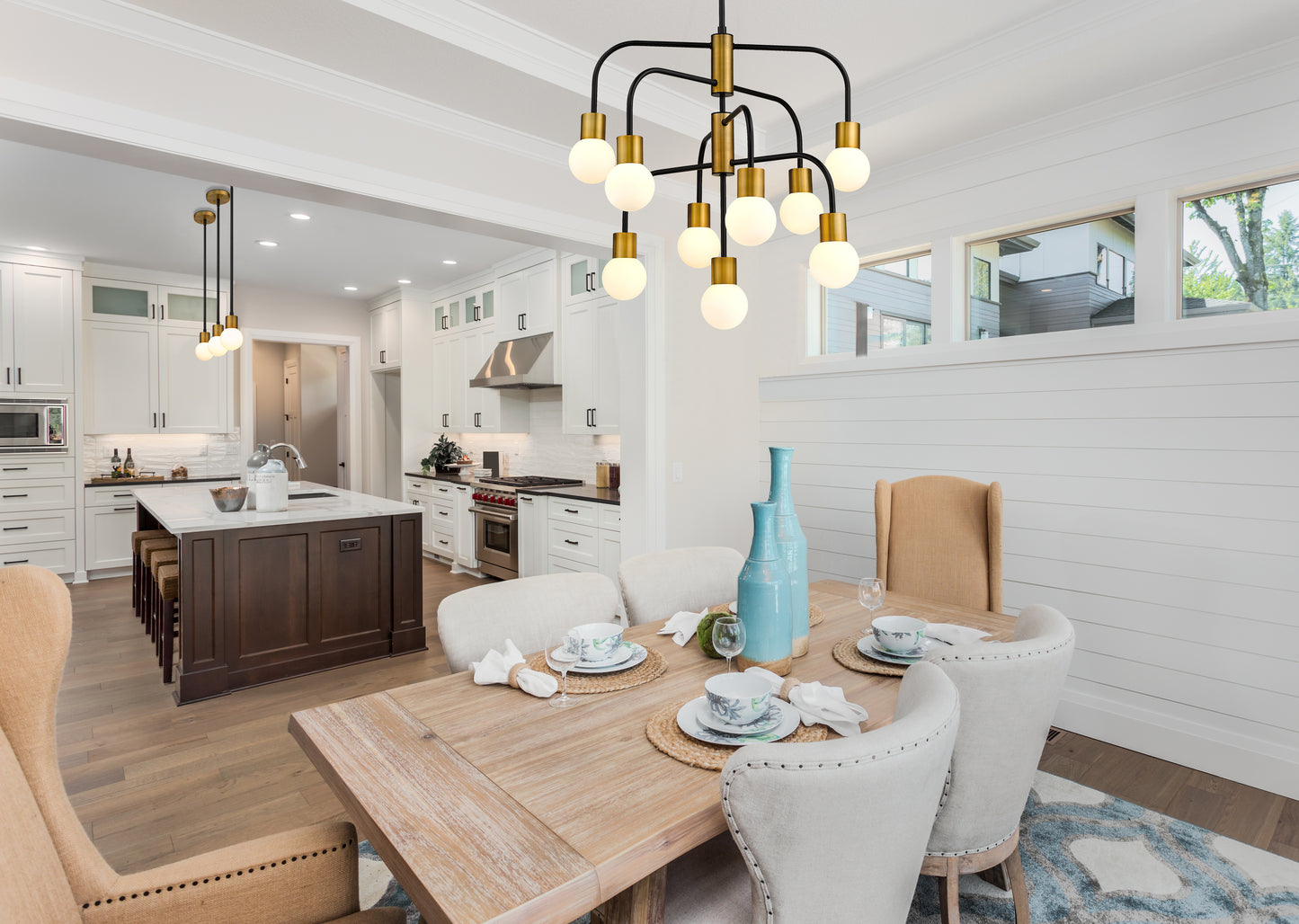 Neutra 9 Light Chandelier Matte Black + Foundry Brass