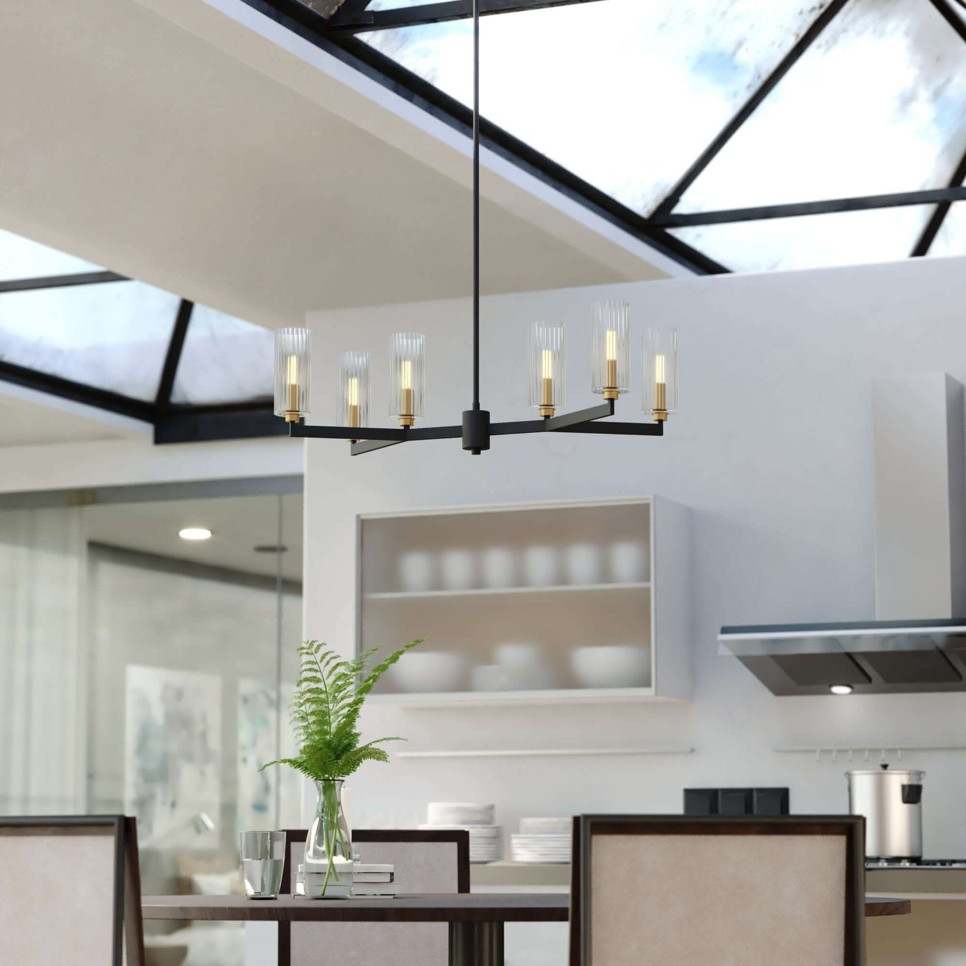 Claremont 31.25-inch 6 Light chandelier showcased above a modern dining table with clear ribbed glass shades and a contemporary transitional design.