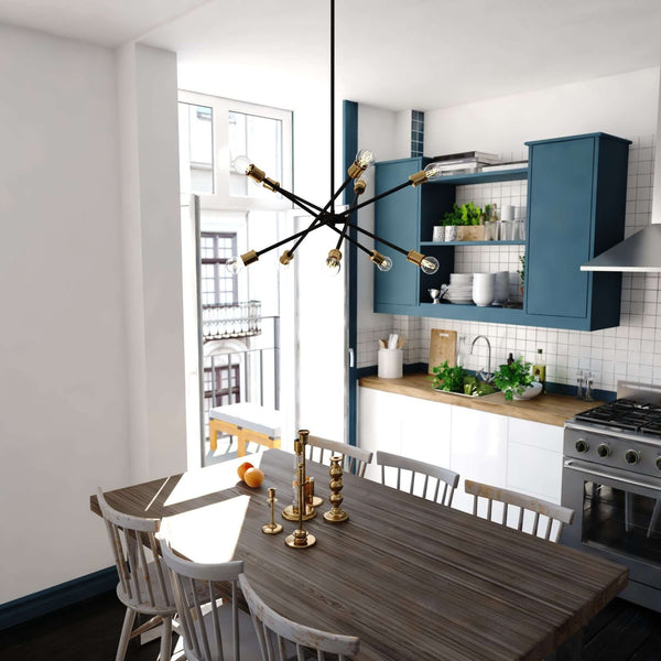 Gresham 32-inch 10 Light chandelier styled above a modern dining table in a contemporary kitchen with blue cabinets and wooden accents.