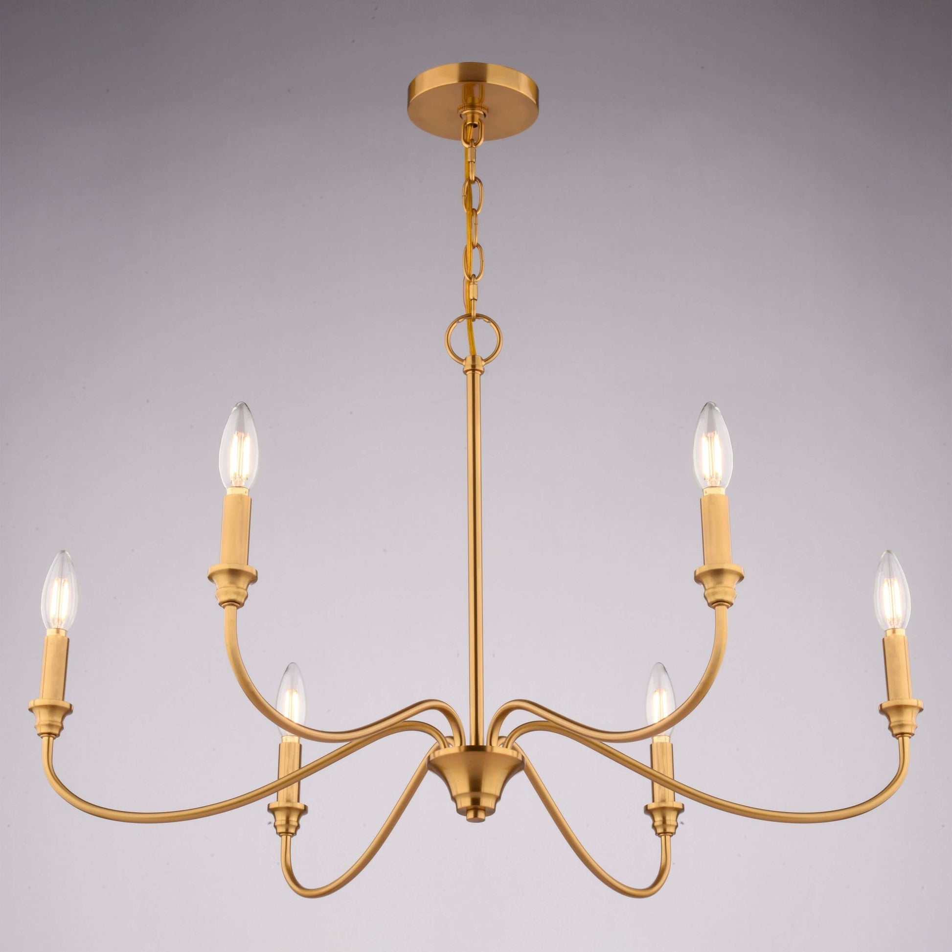 Low-angle front view of Annabelle 30-inch wide 6-light chandelier in satin brass, shown installed against a neutral background